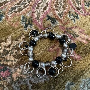 Silver tone and glass bead circle charm bracelet